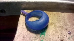 Bombato ring model, wax has been carved down to 1 mm in thickness so it is slightly transparent. Blobs of wax are repairs.